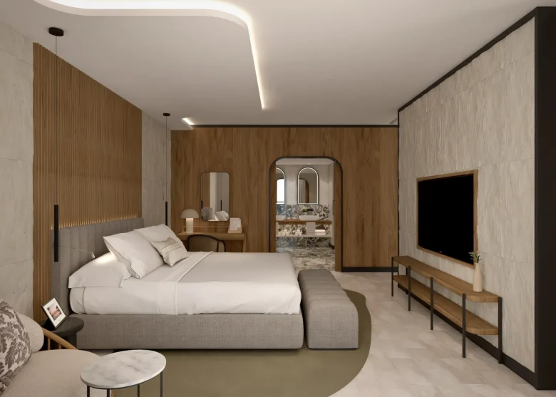 Presidential Suite bedroom with king bed and modern wood accents at Secrets Playa Esmeralda.