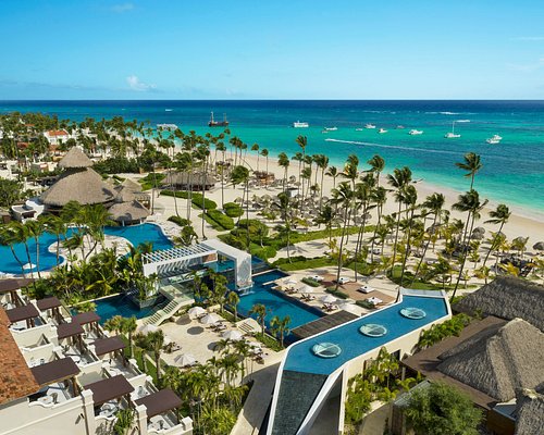 Secrets Royal Beach Punta Cana adults-only all-inclusive resort with beachfront pools and tropical setting.